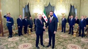 suriye gecici cumhurbaskani sara ilk kez moskovada putinle gorustu gundemde rus asker usleri ve esadin iadesi var Ot3wn53F.jpg